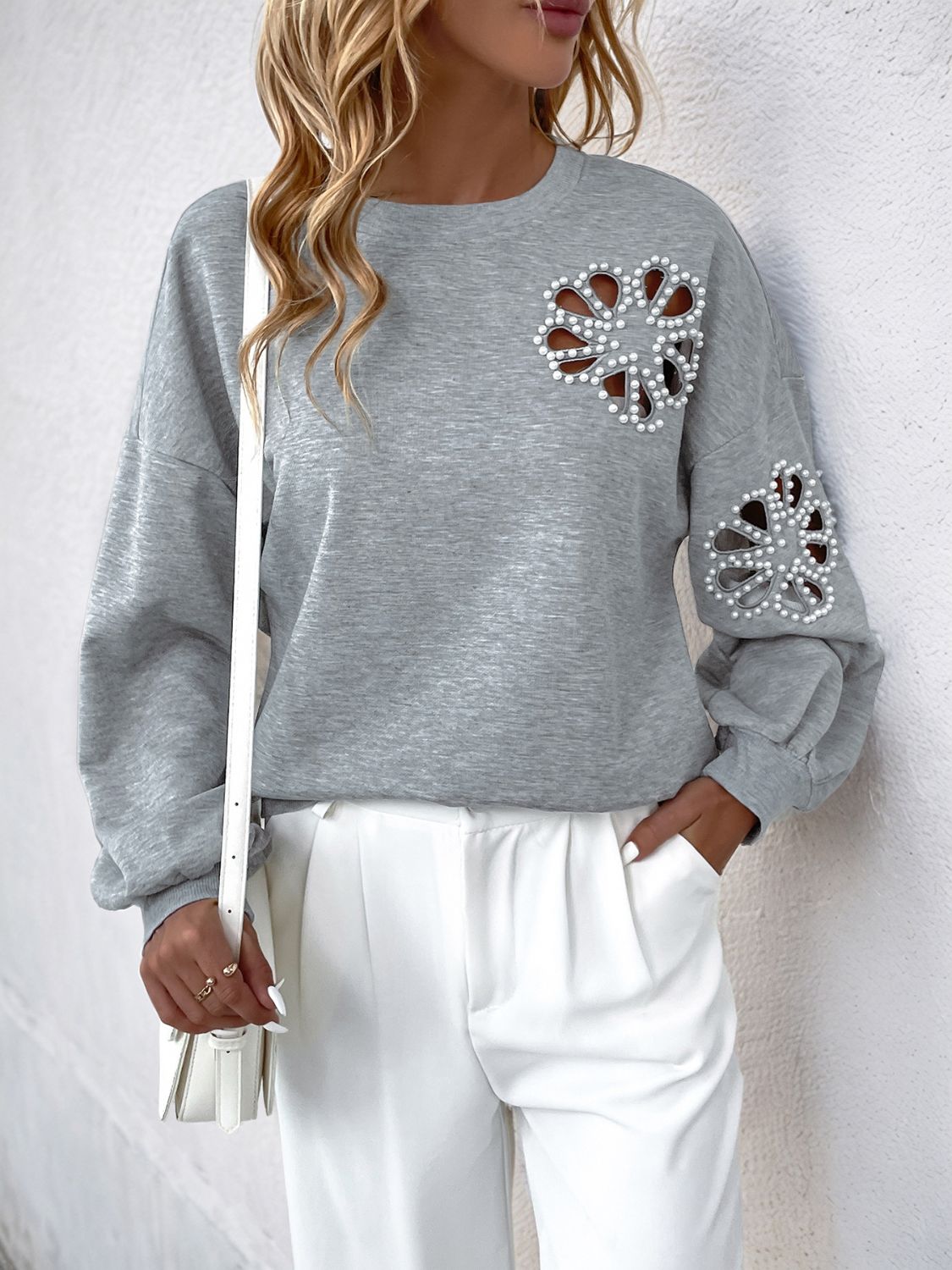 Perfee Cutout Pearl Round Neck Long Sleeve Sweatshirt