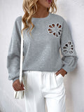 Perfee Cutout Pearl Round Neck Long Sleeve Sweatshirt